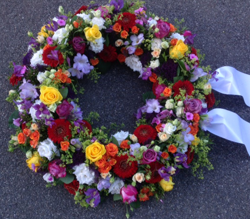 Blumen Nicolaye - rundgesteckter Trauerkranz